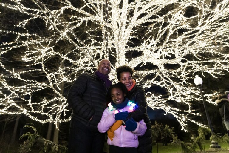 Family In Front of Tree